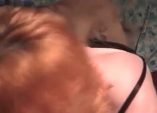 Dirty dog enjoying this redhead's pussy